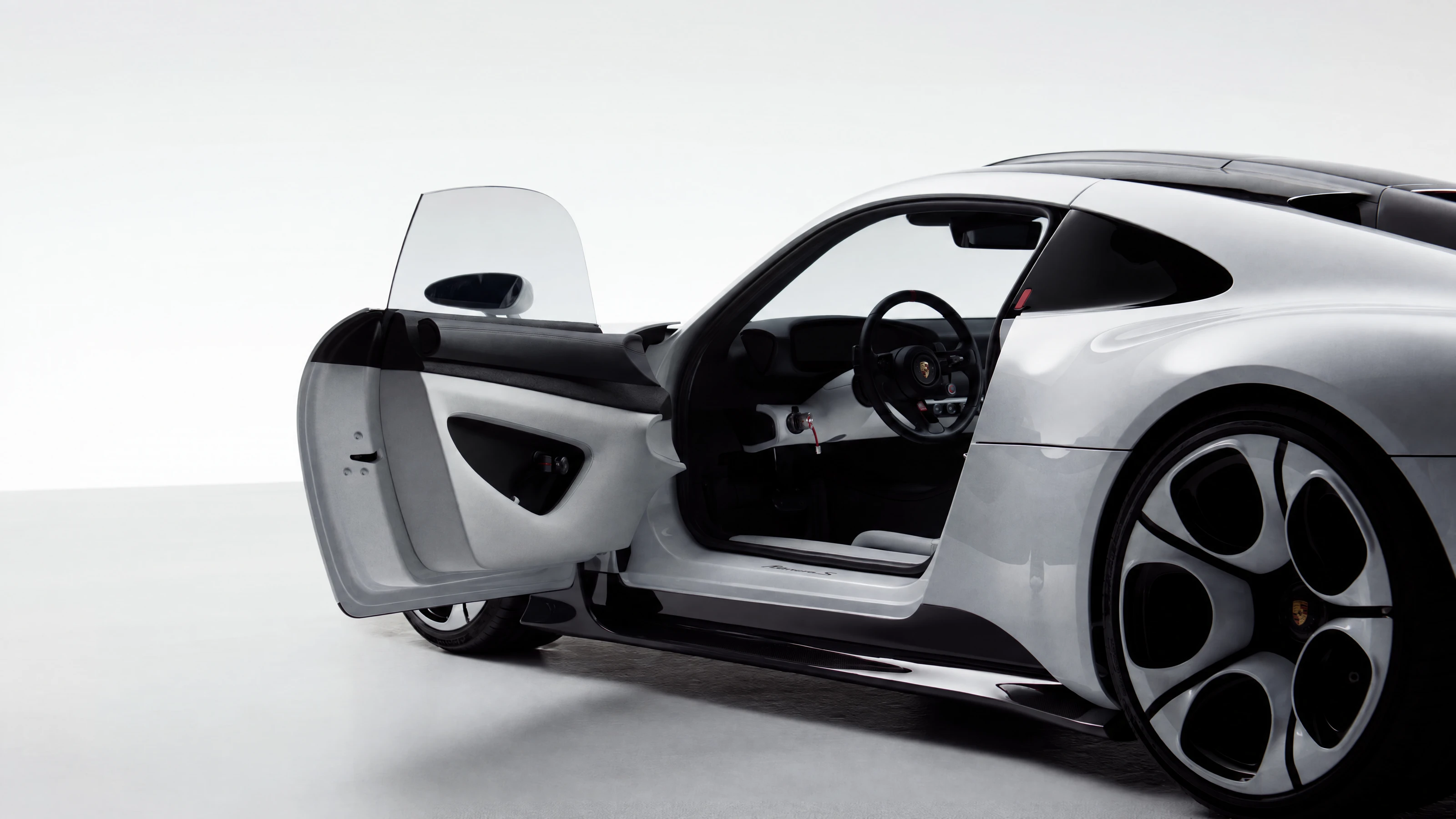The Mission S with its door open, seen from the front quarter
